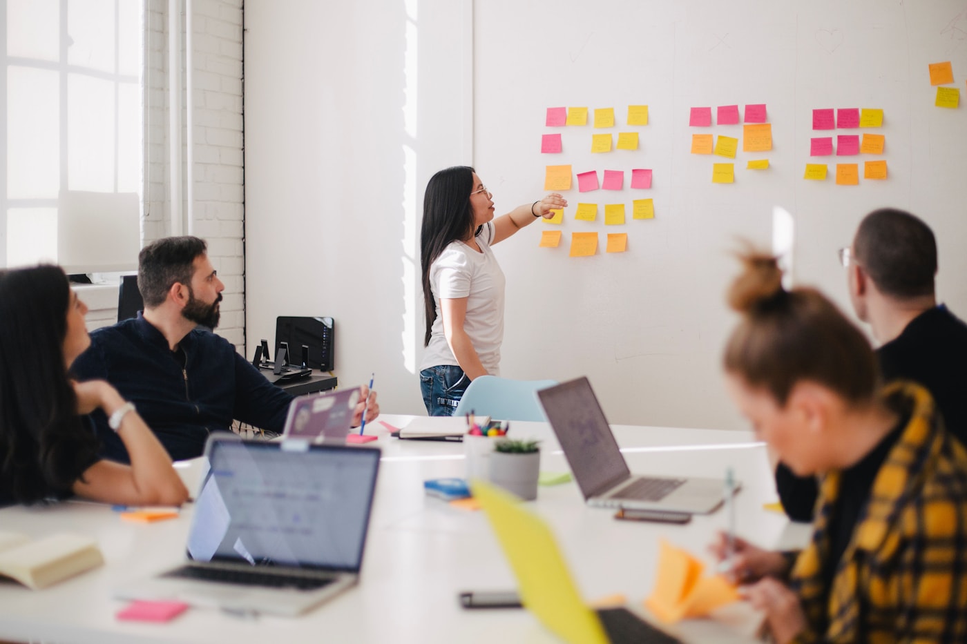 Project team organizing tasks and implementation plans