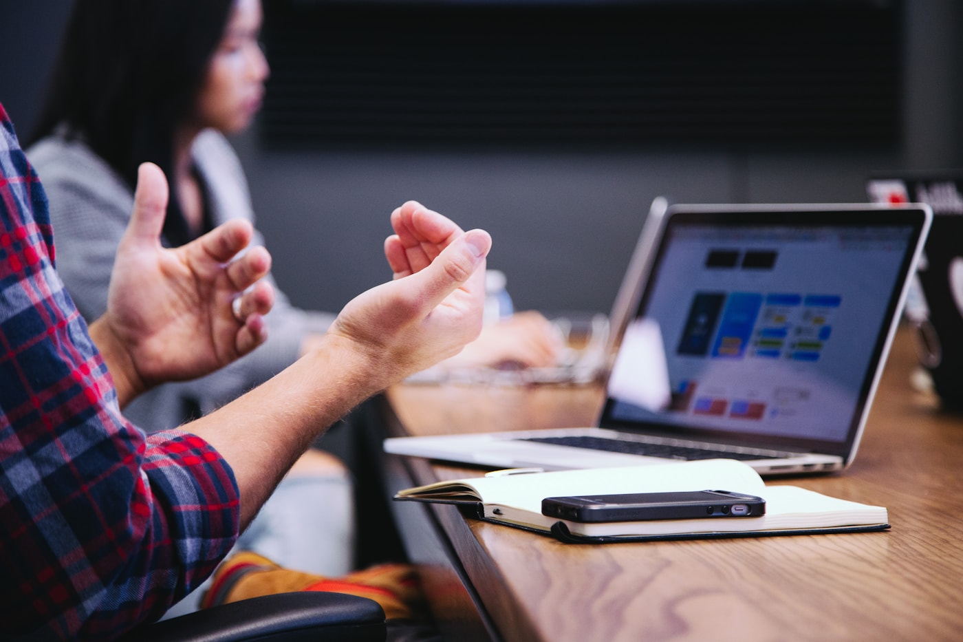 Professional team discussing a digital project in a meeting